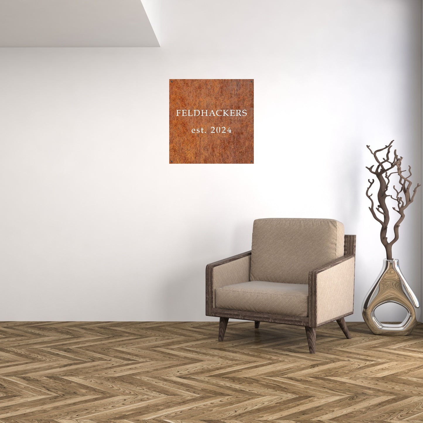 A rusted steel square sign reading "FELDHACKERS est. 2024" mounted on a clean, modern white wall above a beige armchair, blending industrial charm with contemporary interior design.