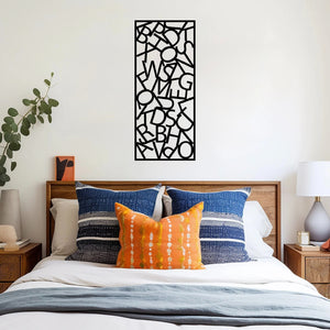 The Alphador Metal Wall Art is mounted on a bedroom wall, creating a bold, artistic focal point above the bed or along a feature wall.