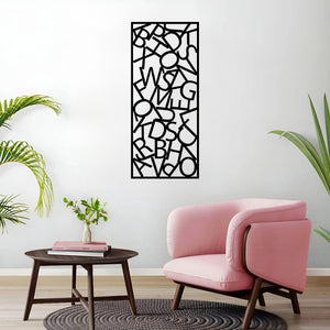 The Alphador Metal Wall Art is mounted on a wall, creating a crisp and modern backdrop for the bold, graphic design.