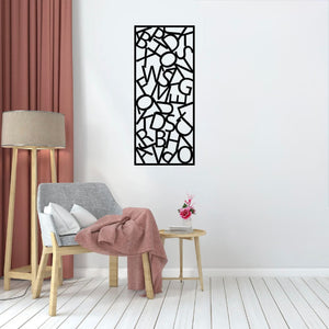 The Alphador Metal Wall Art is hung on a wall above or near a chair, creating a harmonious and visually engaging composition.