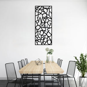 The Alphador Metal Wall Art is hung on a wall above a table, creating a stylish, balanced composition that blends form and function.
