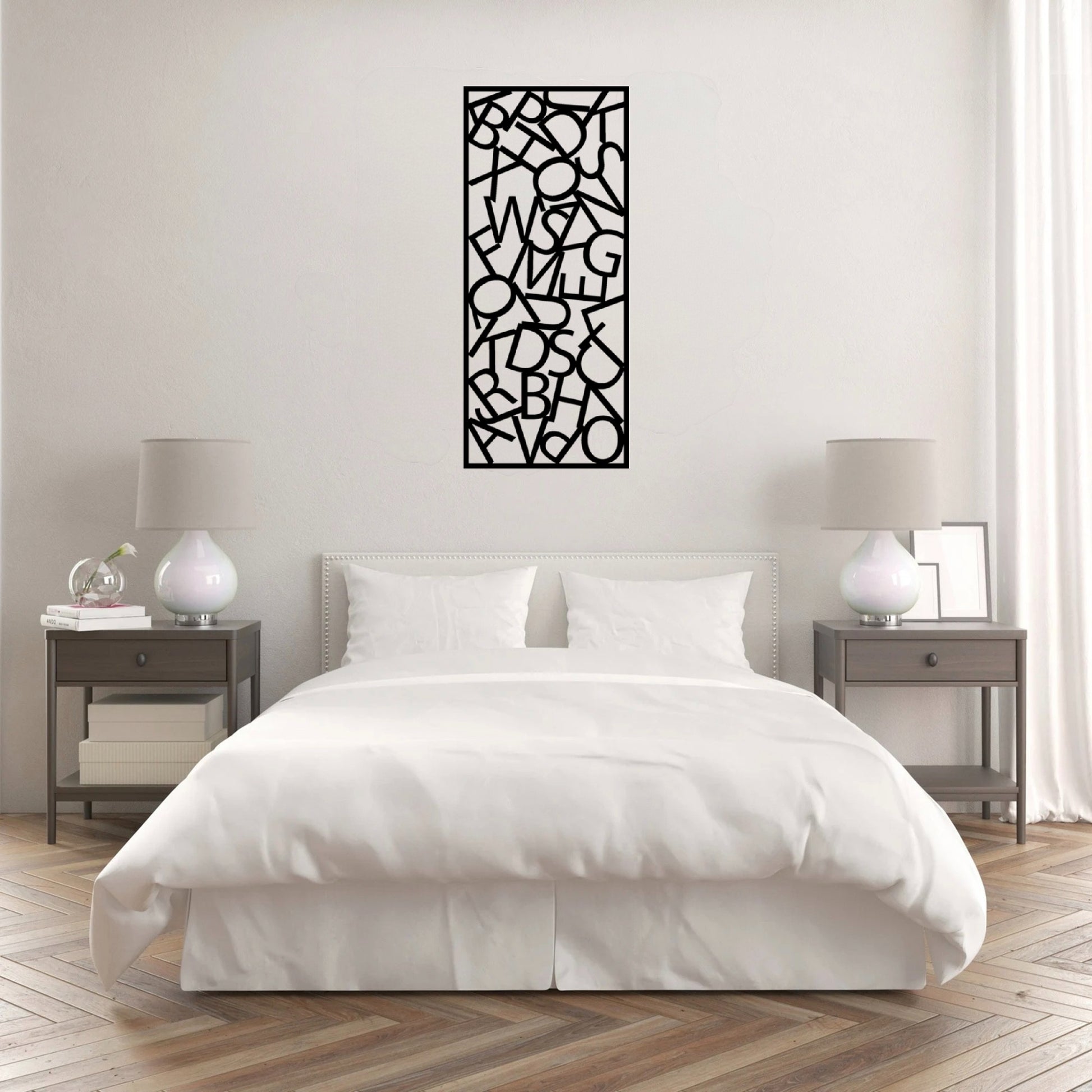 The Alphador Metal Wall Art is hung on the wall of a white bedroom, creating a sleek and contemporary focal point.