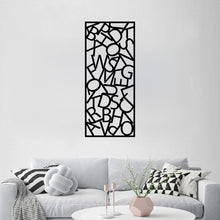 Load image into Gallery viewer, The Alphador Metal Wall Art is stylishly mounted on the wall of a living room, serving as a bold and modern focal point.
