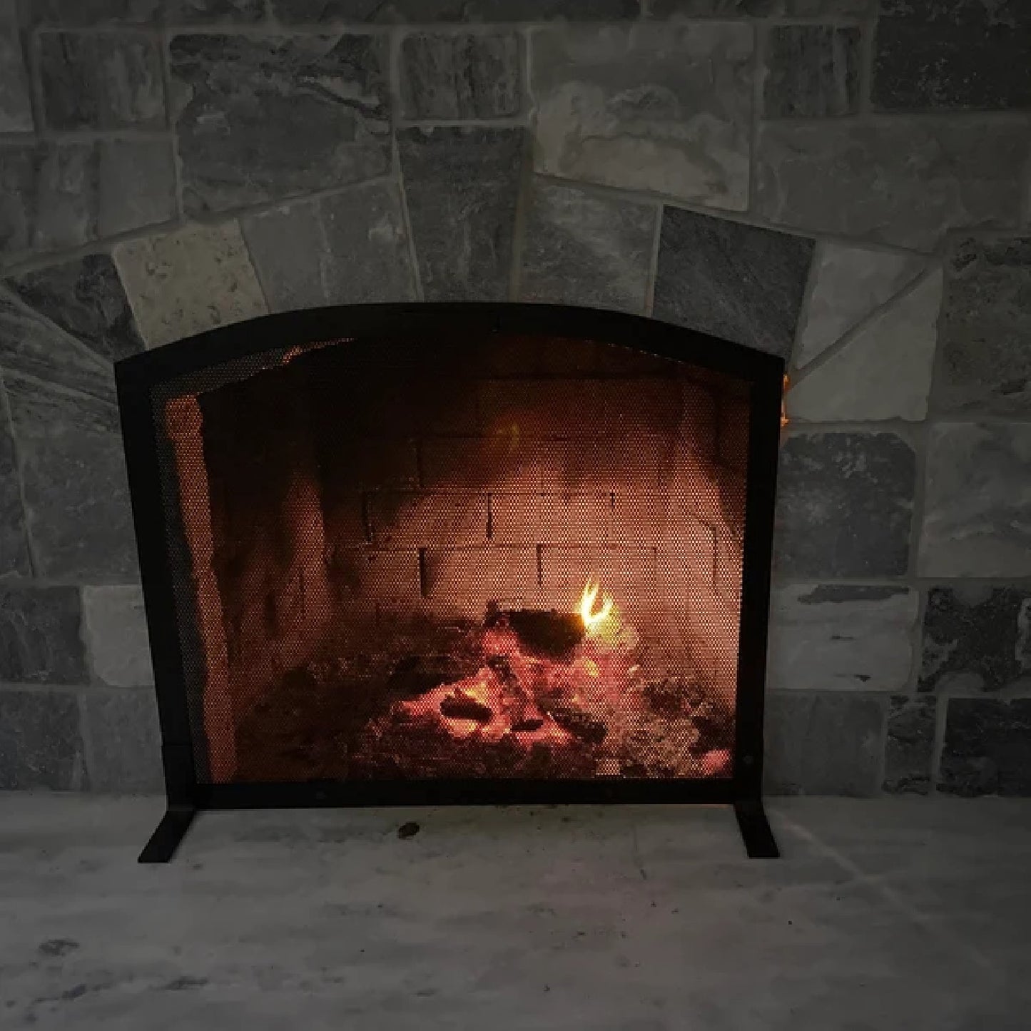 Custom Arched fireplace screen with fire lit