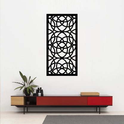 The Ellara Metal Wall Art is prominently displayed on the wall above or near a red desk, creating a striking and dynamic visual contrast.