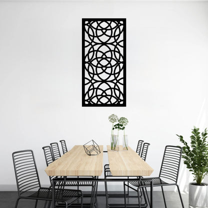 The Ellara Metal Wall Art is hung on a wall above a table, creating a stylish, balanced composition that blends form and function.