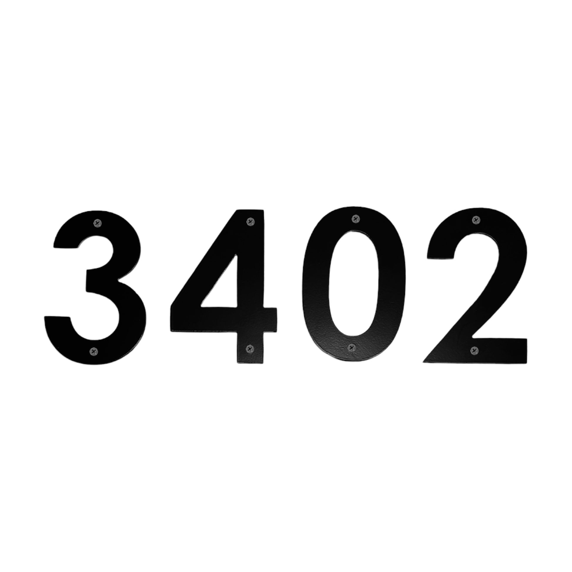 Black metal house numbers mounted on a white background