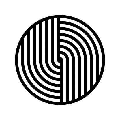 The image features a round metal wall art piece with a bold geometric design. The artwork consists of black curved and straight lines arranged in a symmetrical pattern, creating a modern and minimalist aesthetic.