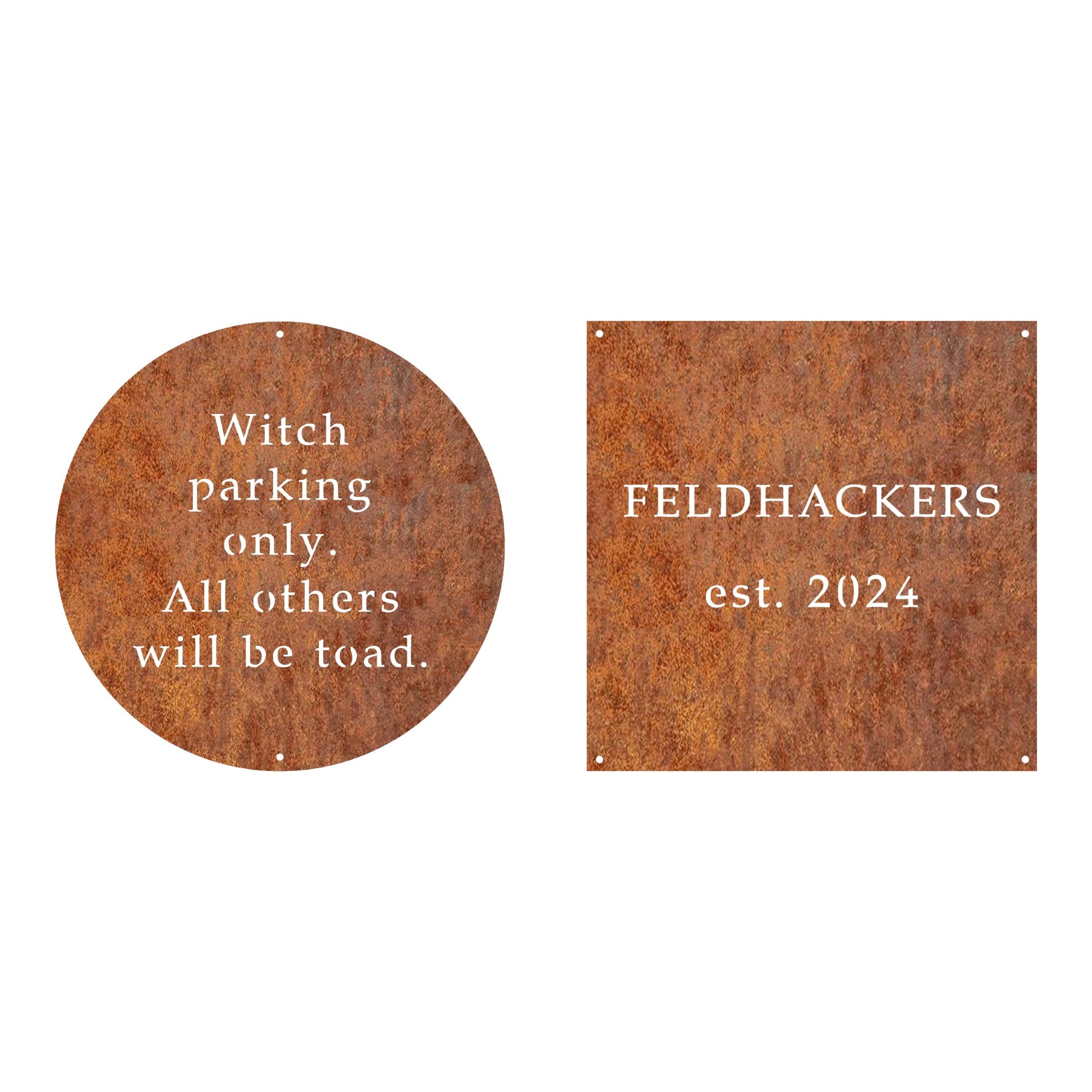 Two rusted steel signs displayed side by side: one circular sign with a humorous "Witch parking only. All others will be toad." message and one square sign featuring "FELDHACKERS est. 2024