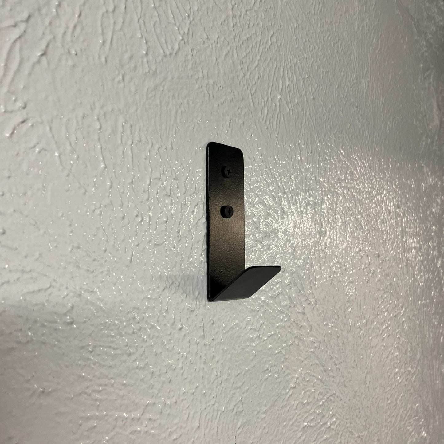 Fold over towel hook