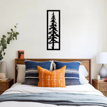 Load image into Gallery viewer, The Sylvara Tree Metal Wall Art is mounted on a bedroom wall, creating a bold, artistic focal point above the bed or along a feature wall.