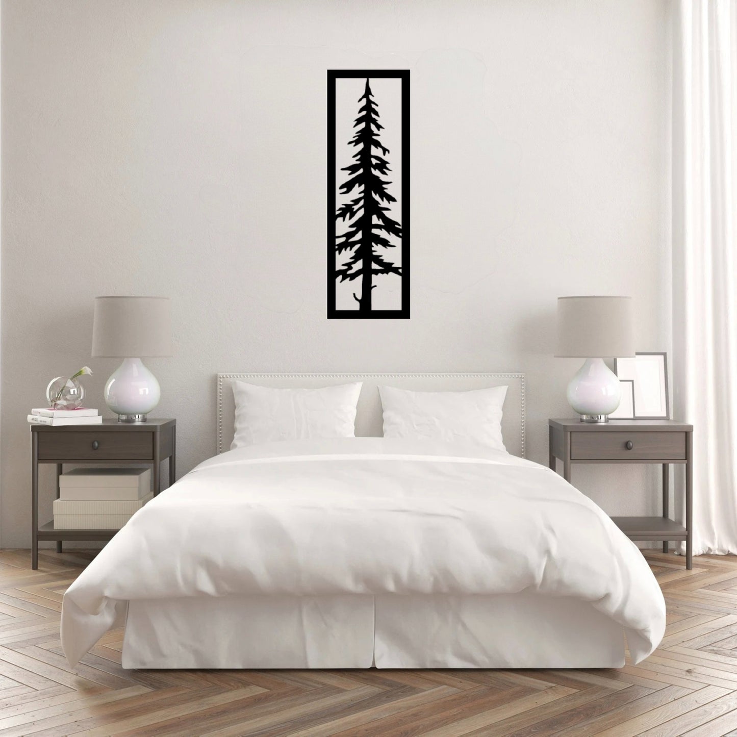 The Sylvara Tree Metal Wall Art is hung on the wall of a white bedroom, creating a sleek and contemporary focal point.