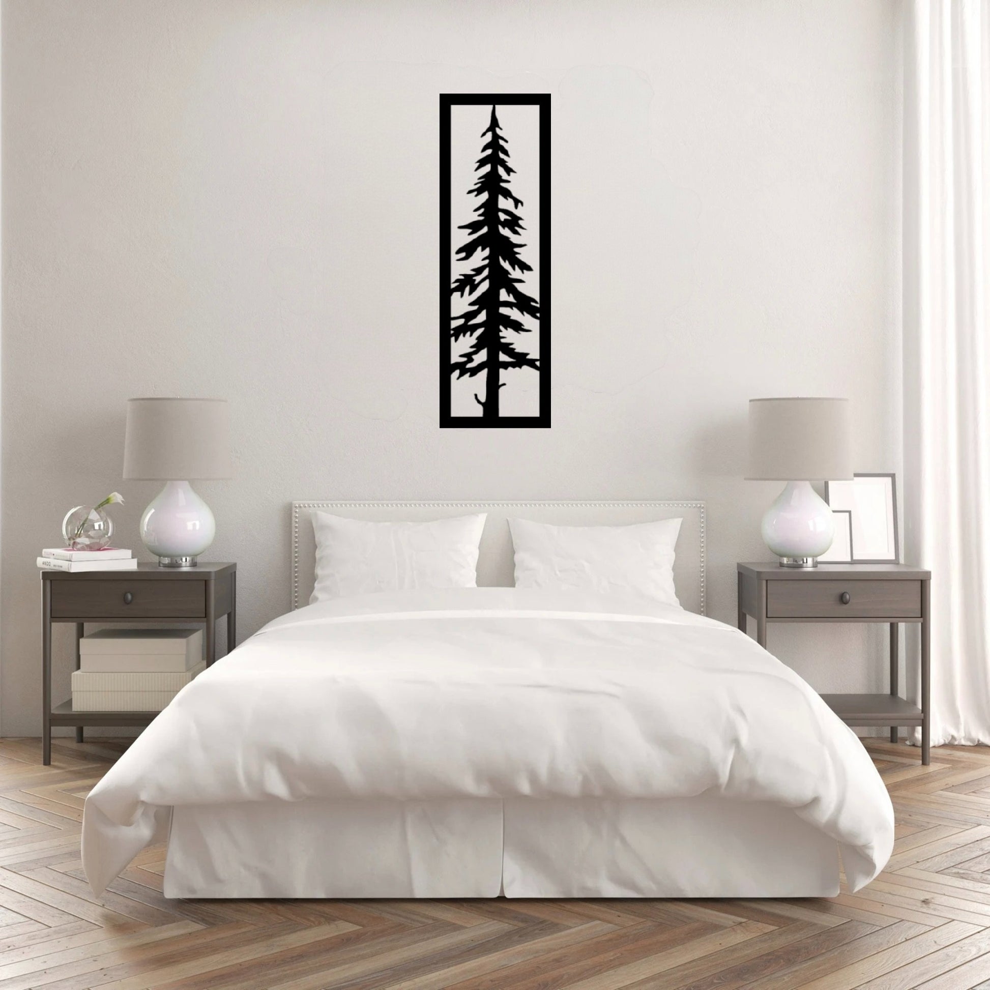 The Sylvara Tree Metal Wall Art is hung on the wall of a white bedroom, creating a sleek and contemporary focal point.