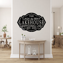 Load image into Gallery viewer, Home entryway with a custom lake house sign on the wall above a table