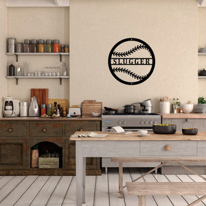 Home kitchen with a table and cabinets and a custom metal sign of a baseball on the wall