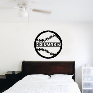 Bedroom with a large custom metal sign of a baseball above the bed