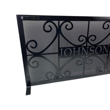 Load image into Gallery viewer, Close up of a customized personalized fireplace screen with handles and scroll and custom name design