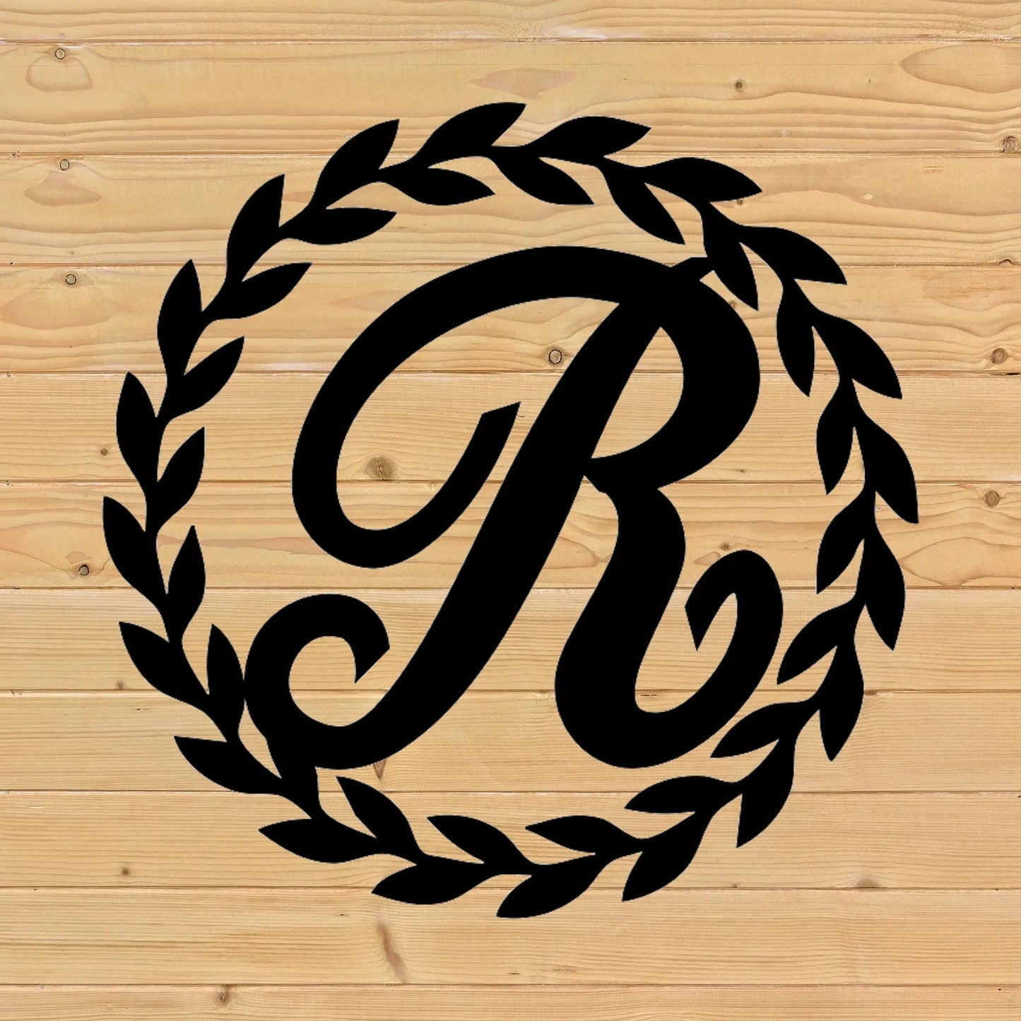 Custom monogrammed wreath with custom family name letter
