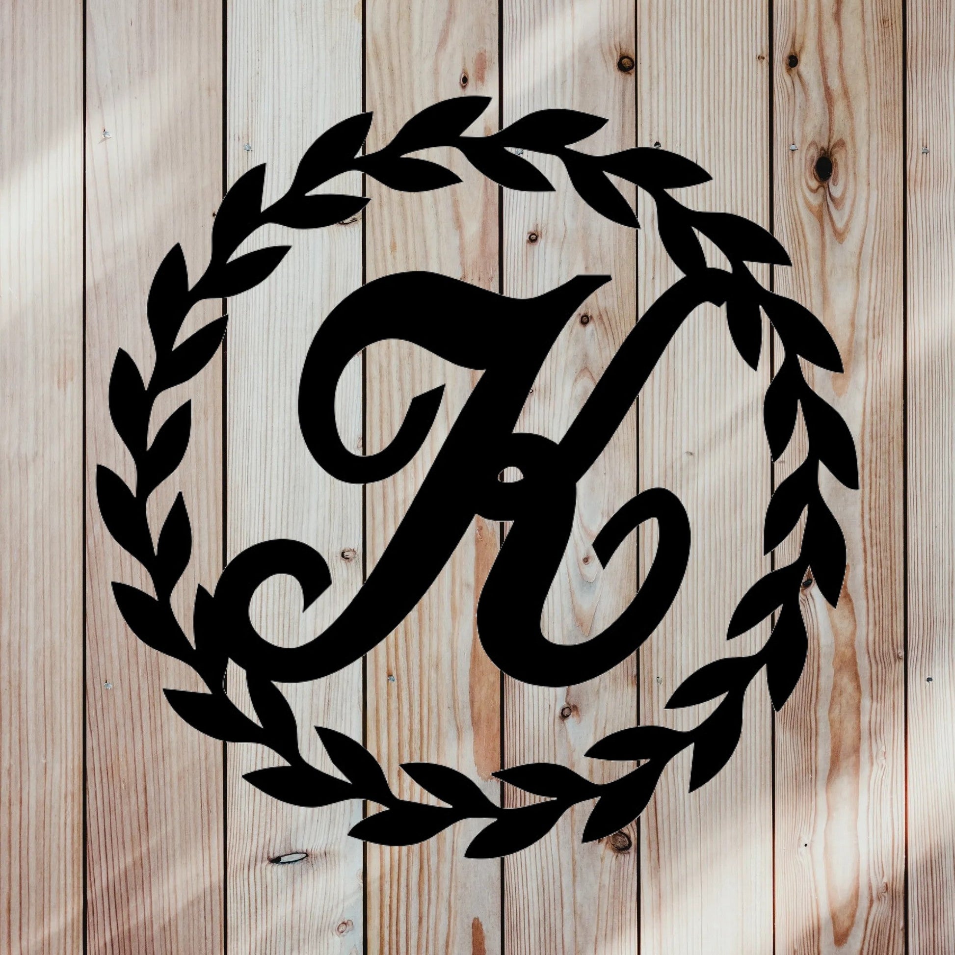 Custom monogrammed wreath with custom family name letter