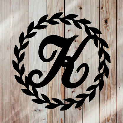 Custom monogrammed wreath with custom family name letter