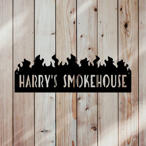 custom smokehouse sign with fence mounted 